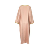 Front view of a CASA JOHARA FASHION rose gold satin kaftan featuring a V-neckline and gold braided trim.
