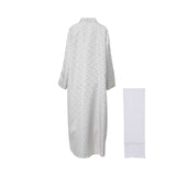 Back view of the abaya showing the full-length white geometric textured jacquard fabric and matching Sheila.