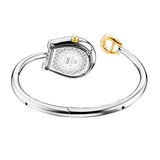 An angled rear view of the Aigner Flora S timepiece showcasing the engraved stainless steel horseshoe case back detailed with technical specs, the textured background engraving, the fluted yellow gold crown, and the open torque bypass bangle structure.