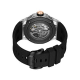 Rear perspective view detailing the mineral crystal exhibition caseback that exposes the automatic rotor, paired with a view of the black pin buckle and black silicone strap loops.