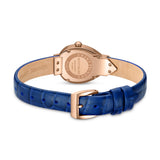Rear view detailing the polished rose gold-tone caseback with Petit Palais, Made in France, and model number PP709002 engravings, alongside the "Genuine Leather" stamp on the strap underside.