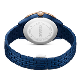 A product view of the reverse side of the Swarovski Octea Moon watch, showing the brushed stainless steel caseback engraved with official Swiss Made branding alongside the smooth blue finish of the inner bracelet links.