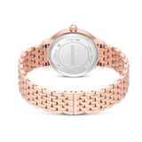 A product view of the reverse side of the Swarovski Imber watch, showing the brushed stainless steel caseback engraved with official branding and the smooth, rose gold-tone interior link construction.