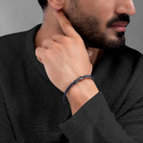 Detailed close-up studio shot of the Franco bracelet's centerpiece, highlighting the brushed and polished IP gunmetal texture and etched 1881 logo.