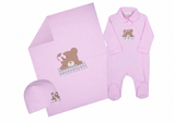 Pink baby sleepsuit set including a footed sleepsuit, blanket, and hat, all with a teddy bear appliqué