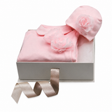 Pink baby sleepsuit set, including a long-sleeved garment with a rounded collar and a matching hat, both adorned with layered