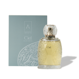 Artist’O Ciel Eau de Parfum in an ornate clear glass bottle with soft blue luxury packaging, showcasing a fresh and elegant fragrance design – Available for Online Purchase
