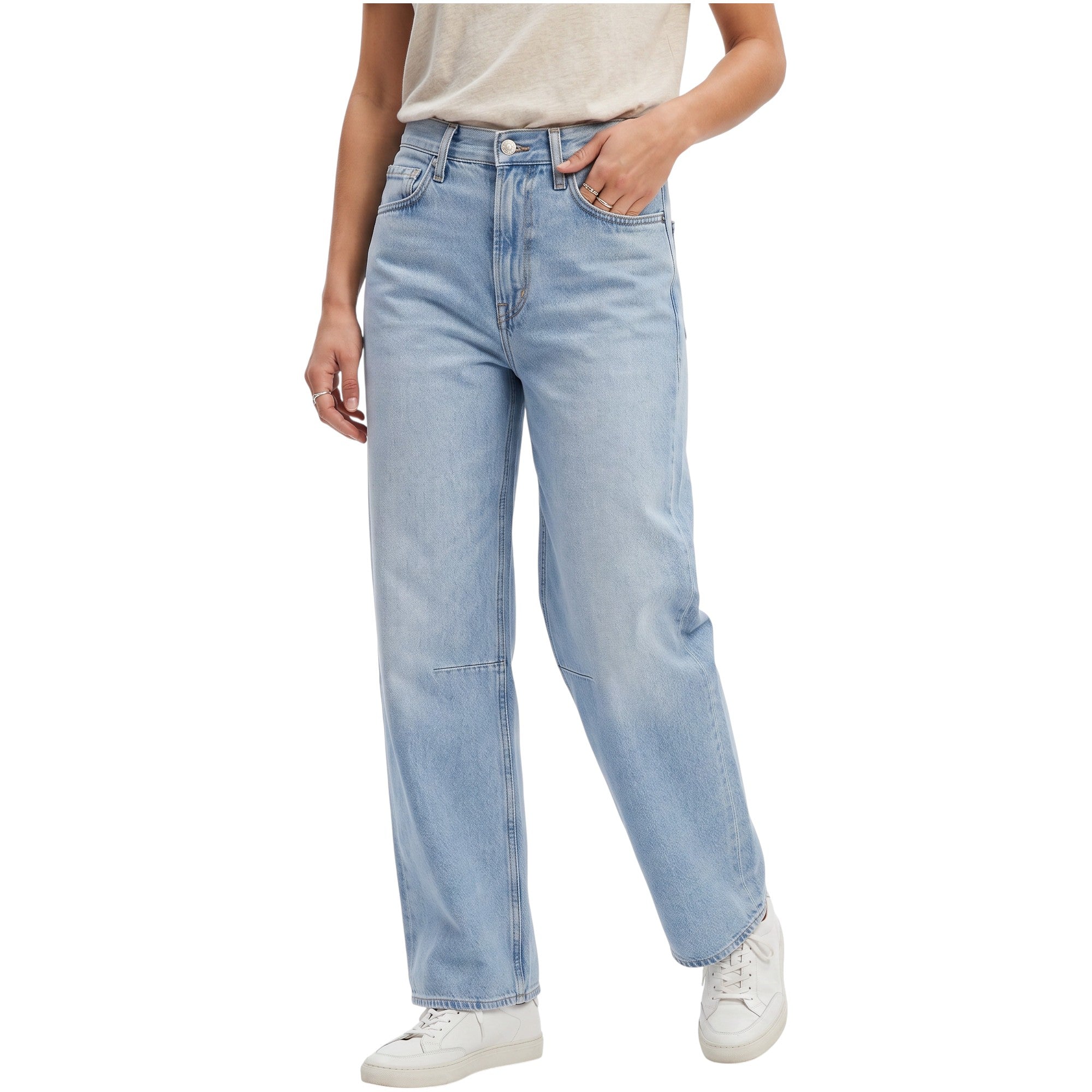 Cropped model shot showing a person wearing the Citizens of Humanity high-rise wide-leg jeans, styled with a neutral t-shirt and white leather sneakers.
