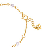 A close-up studio photograph of the bracelet closure system, showcasing the high-polish gold-plated lobster claw clasp, integrated chain adjustment loops, a nearby pearl station, and the suspended signature double-E monogram end tag.