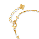 Focused perspective view of the gold-plated lobster claw clasp mechanism, extension link rings, and the square logo closure plaque.
