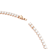 A detailed macro close-up shot of the Swarovski Matrix necklace closure, highlighting the open tongue-and-groove box clasp mechanism and the faceted rose gold safety latch.