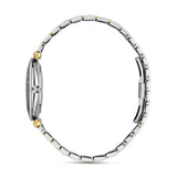 Side view demonstrating the ultra-slim 34mm case profile, the polished midcase wall, and the continuous uniform link pattern of the two-tone bracelet band.