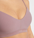 Close-up view of model wearing the Sloggi Ever Ease light purple padded bra, showing the smooth cups and comfortable wire-free design. Now Available Online
