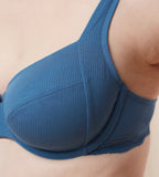 Close-up view of third Model wearing the Triumph Natural Spotlight blue wired bra, showcasing the lace-covered cups and supportive underwire design. Available Online Now