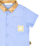 Close up Shirt view of the Alviero Martini Kids Blue Polo Shirt & Bermuda Shorts Set. Find Online Today at Blue Salon Qatar.
