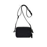 Front view of the Coach Tabby Messenger Bag 19 in metallic silver leather, featuring a structured square silhouette, an iconic silver signature C logo on the flap, and a wide adjustable crossbody strap against a white background.