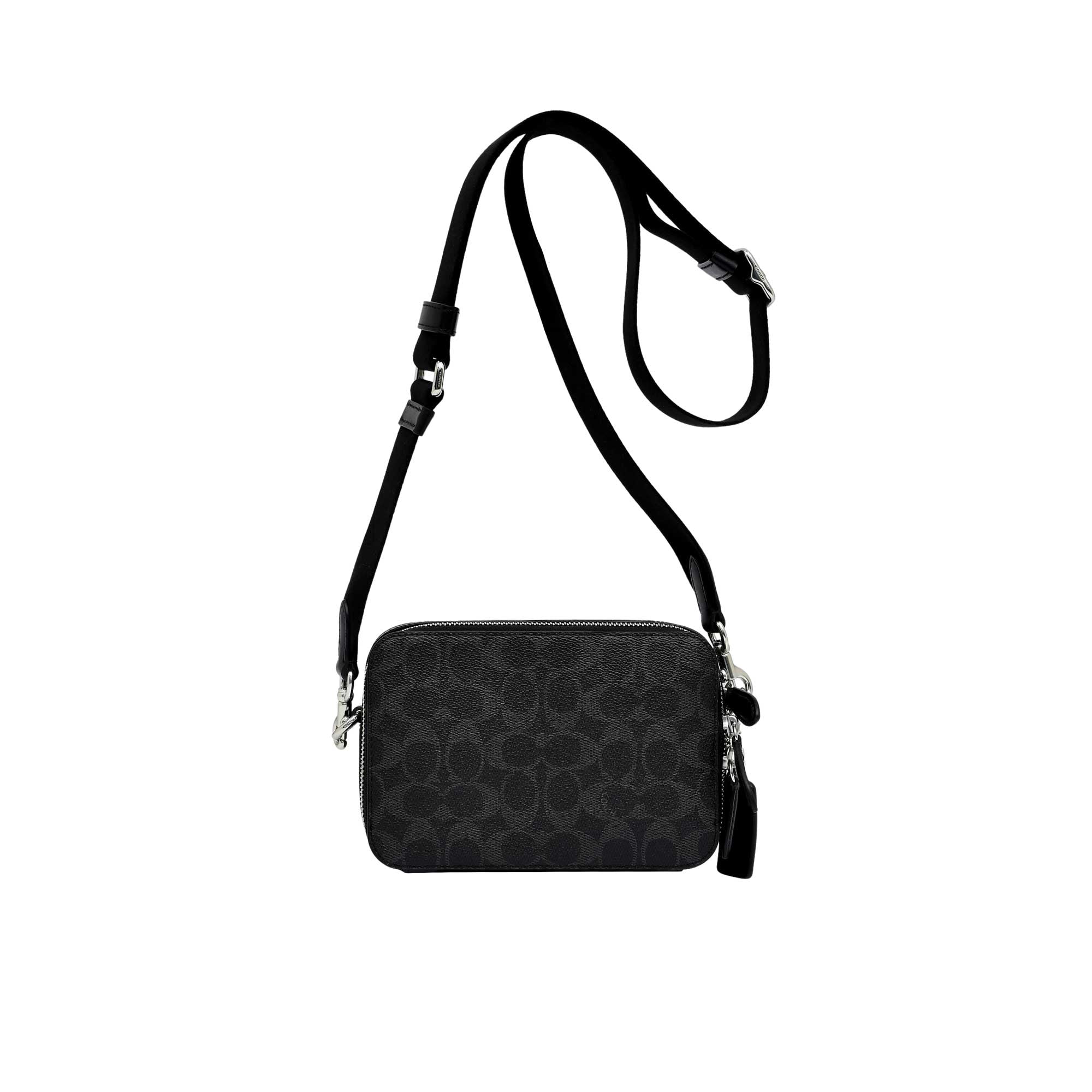 Front view of the Coach Tabby Messenger Bag 19 in black leather, featuring a structured square silhouette, an iconic tonal black signature C logo on the flap, and a wide adjustable crossbody strap against a white background.