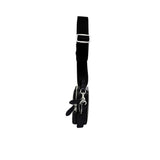 Side profile view of the black Coach Tabby messenger bag showing its expandable multi-gusset structure, neat finished edges, and the black dogleash clasp attaching the wide strap.