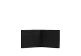 Interior view of an open Coach bifold wallet in black leather showing eight card slots and a central bill compartment.