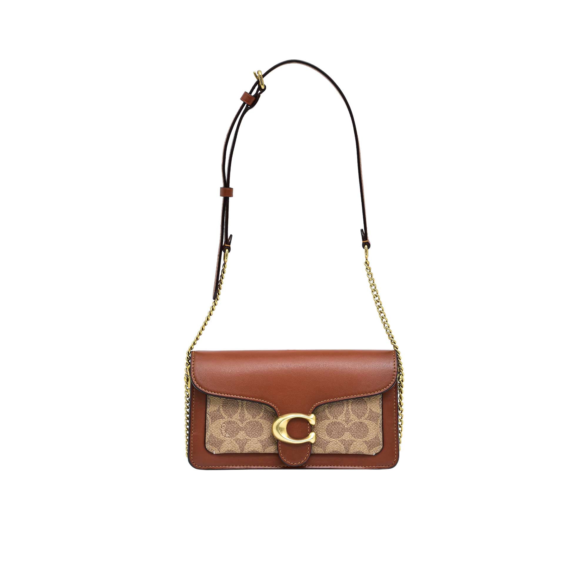 Front view of the Coach Tabby Shoulder Bag 26 in metallic silver leather, featuring a structured rectangular shape, a prominent silver signature C logo clasp, and a short matching leather top-handle against a white background.
