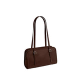 Side-angle view of the Coach Lana shoulder bag highlighting its triple-compartment construction and integrated handles.