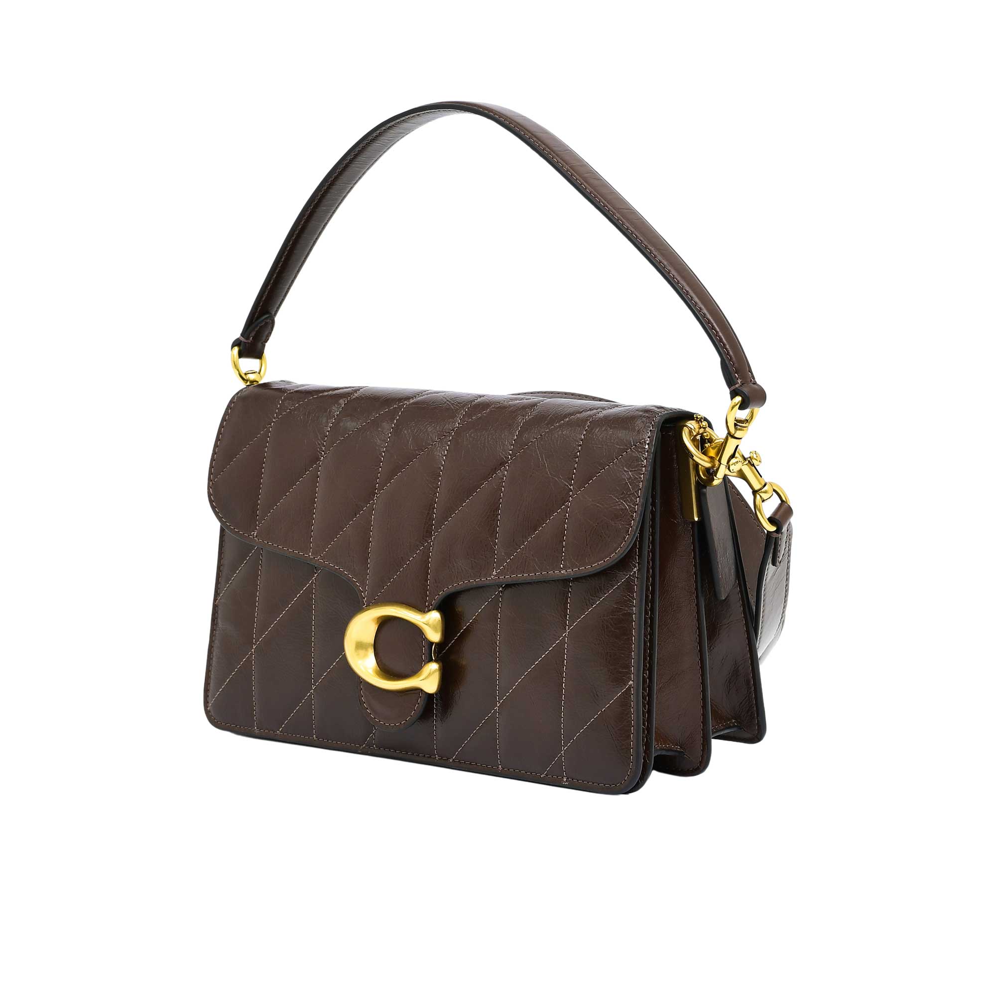 Side profile view of the maple brown Coach Tabby messenger bag showing its expandable multi-gusset structure, neat finished edges, and the brown dogleash clasp attaching the wide strap.