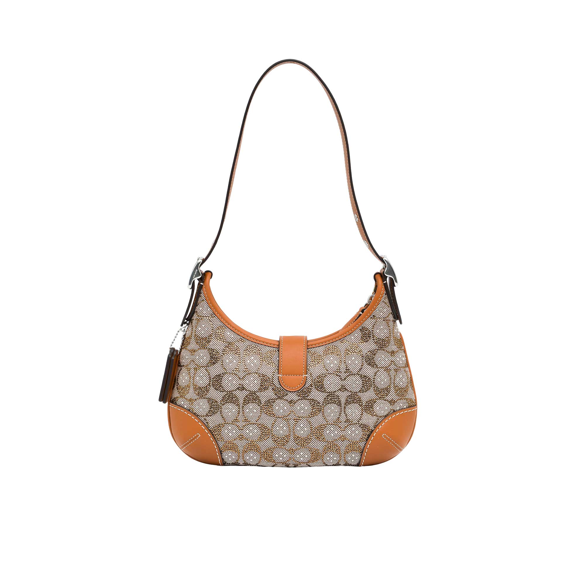 Handbag with patterned design and orange accents on a white background.