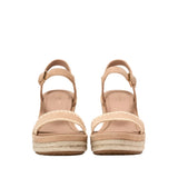 Cole Haan Women's Cloudfeel Asbury Espadrille Wedge Sandals Pair of beige wedge sandals with espadrille soles on a white background