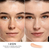 A curved streak of light peach-toned liquid concealer, shade 120N, with warm neutral undertones.
