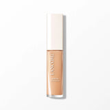 Lancome Serum Concealer in a light beige shade, presented in a clear rectangular bottle with an opaque white cap.