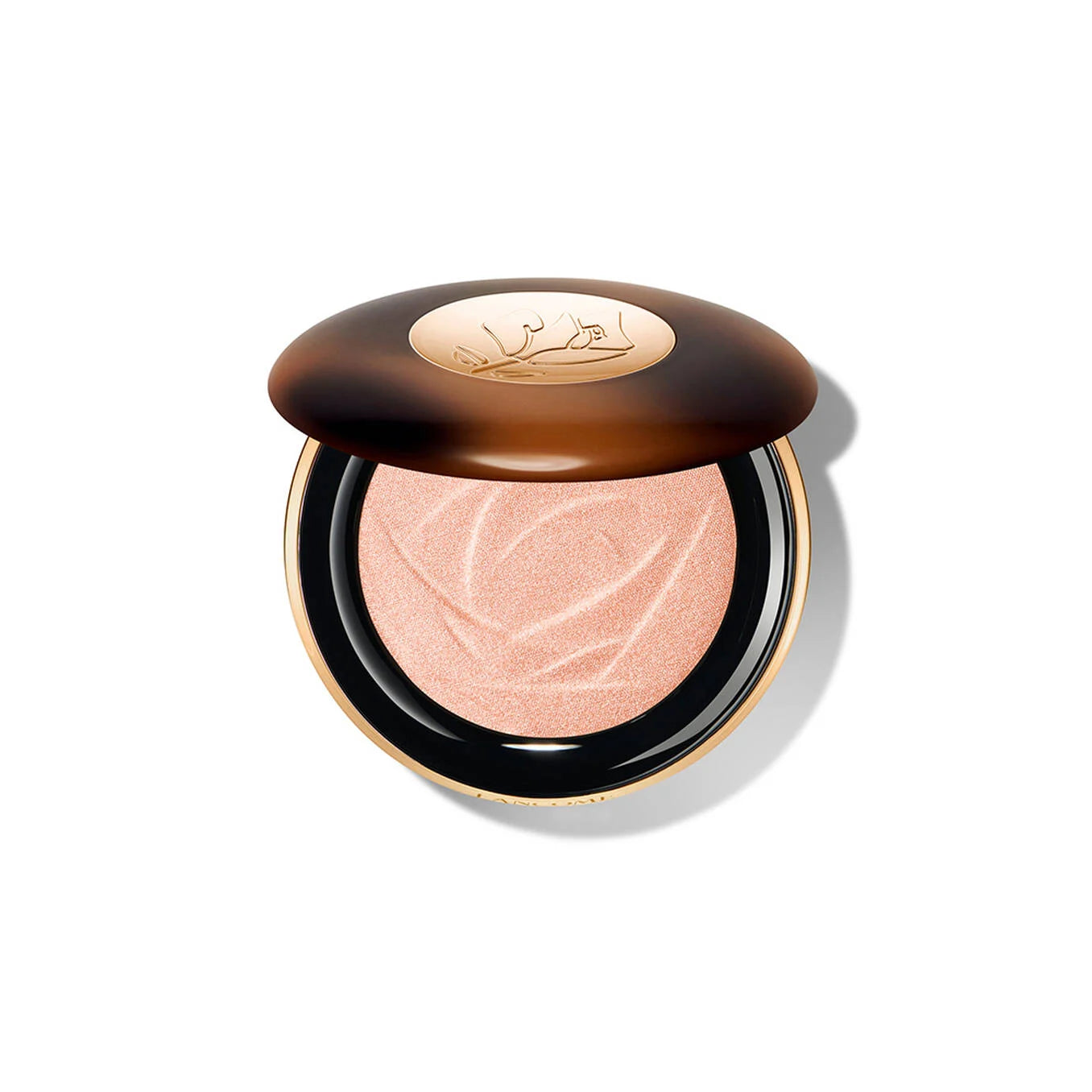 Round compact with a dark brown tortoiseshell lid, gold-toned logo plate, and shimmery peach powder with an embossed rose pat