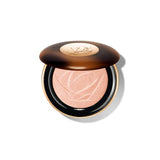 Round compact with a dark brown tortoiseshell lid, gold-toned logo plate, and shimmery peach powder with an embossed rose pat