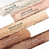 Five shimmery powder highlighter shades: icy champagne, blush champagne, peachy gold, warm golden copper, and deep rosy bronz