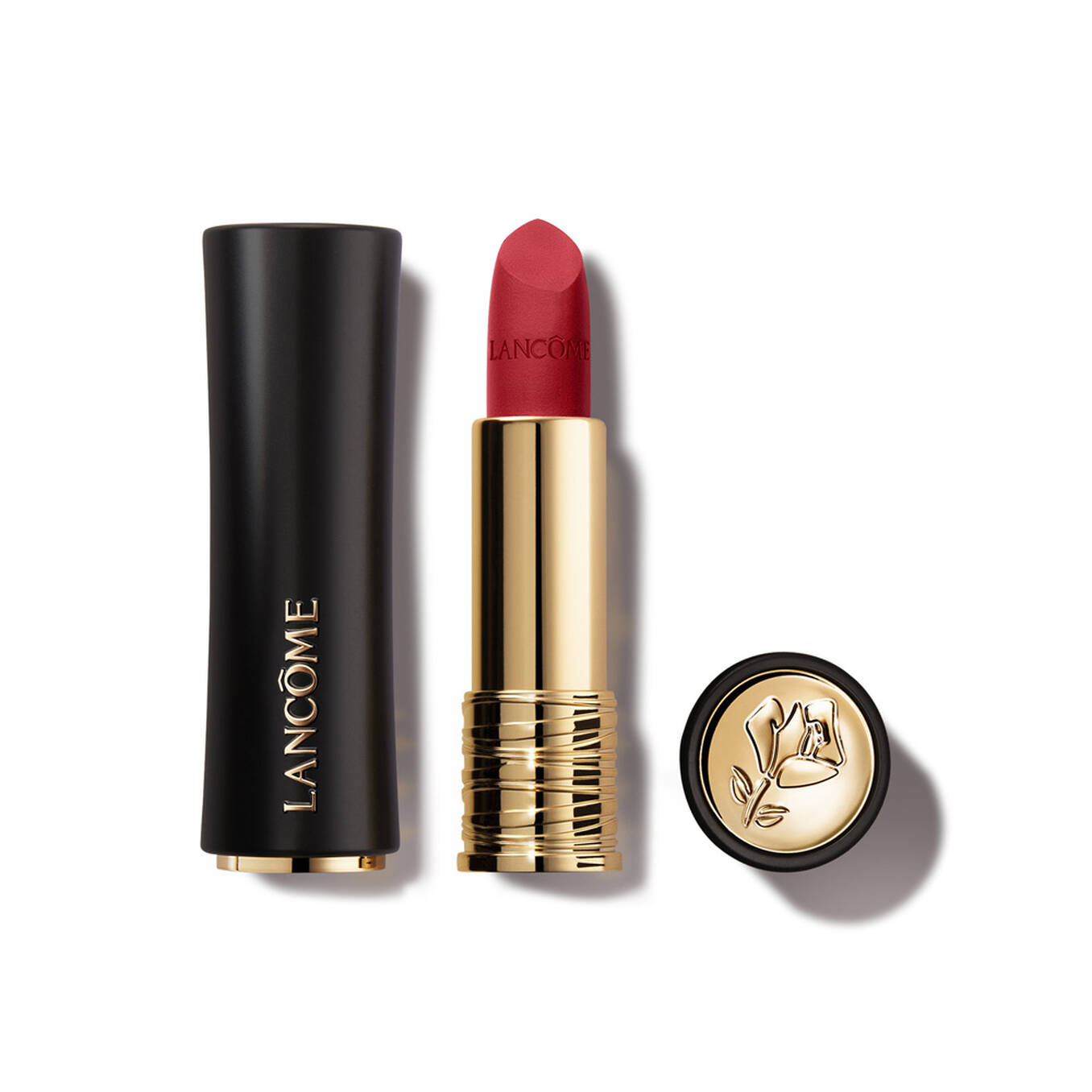 Matte black lipstick tube with gold-toned accents. Red lipstick bullet with "LANCOME" embossed. Gold-toned rose emblem on the