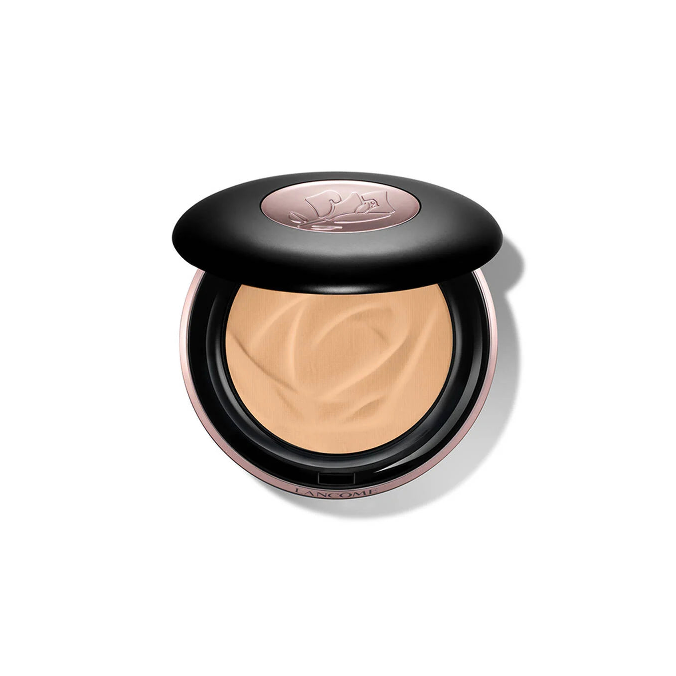 Partially open black compact with rose-gold-toned trim. Fair pressed powder with swirls inside. Embossed rose logo on the lid