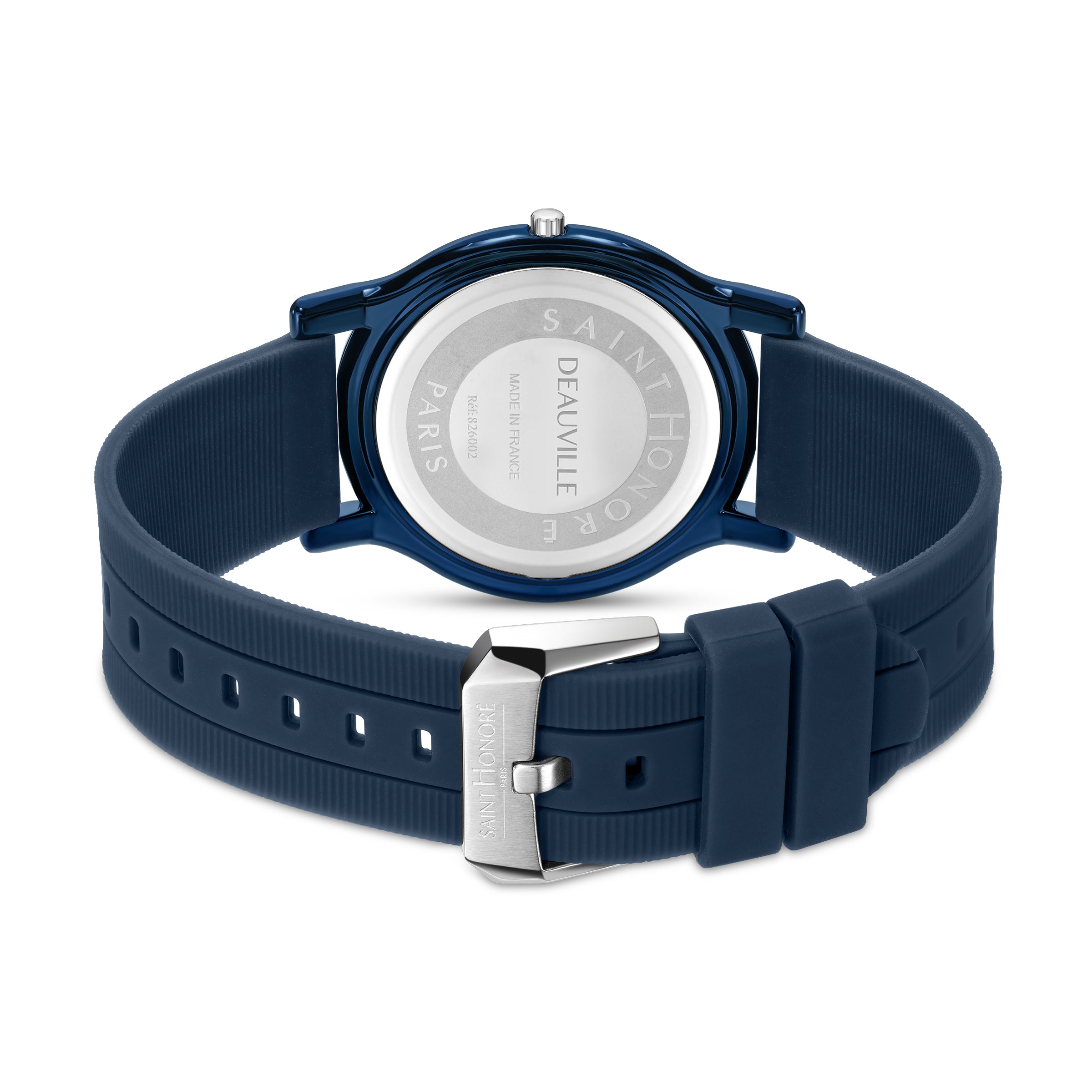 Blue watch with a blue silicon strap and a silver-toned buckle. The silver-toned case back and buckle are engraved.