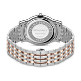 Back view of a silver-toned watch with a round case. The metal link bracelet features silver-toned outer links and rose-gold-