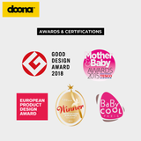 The product is not visible in this image, which displays various awards and certifications for the Doona brand.