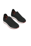 Pair of black knitted slip-on runner shoes with white midsoles and dark red outsoles, featuring ribbed detailing on the vamp.