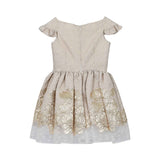 Back view of David Charles gold floral dress showing the concealed zip closure and pleated skirt with polka-dot tulle trim.