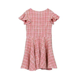 Back view of the girls' pink tweed David Charles dress showing the flared ruffle sleeves and invisible zipper closure.