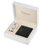 A high-angle studio shot of the Freelook Paris women's luxury 2-piece gift set inside an opened white presentation box, showcasing the stainless steel link bracelet watch with its clean white dial resting on a cushion beside a black pebbled leather wallet stamped with a silver Freelook logo.