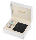 A high-angle studio shot of the Freelook Paris women's luxury 2-piece gift set inside an opened white presentation box, showcasing the stainless steel link bracelet watch with its light blue dial resting on a cushion beside a black pebbled leather wallet stamped with a silver Freelook logo.