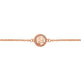A flat close-up shot focusing on the center station of the Escada Madelene bracelet, highlighting the graphic back-to-back EE monogram design and its intricate twisted-rope frame.