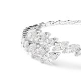 A detailed macro close-up shot focusing on the central centerpiece of the Swarovski Mesmera bracelet, emphasizing the exceptional facet work, crisp prongs, and internal fire of the clustered marquise clear crystals.