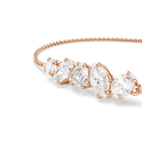 A detailed close-up shot of the focal setting on the Swarovski Mesmera bracelet, emphasizing the flawless alignment of the prong-set round, oval, pear, and marquise clear crystals.