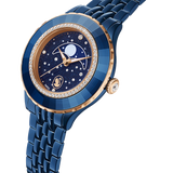 A close-up, three-quarter perspective studio shot of the Swarovski Octea Moon watch set against a deep black background, emphasizing the fine details of the starry dial, the inner pavé crystal ring, and the faceted crystal bezel texture.