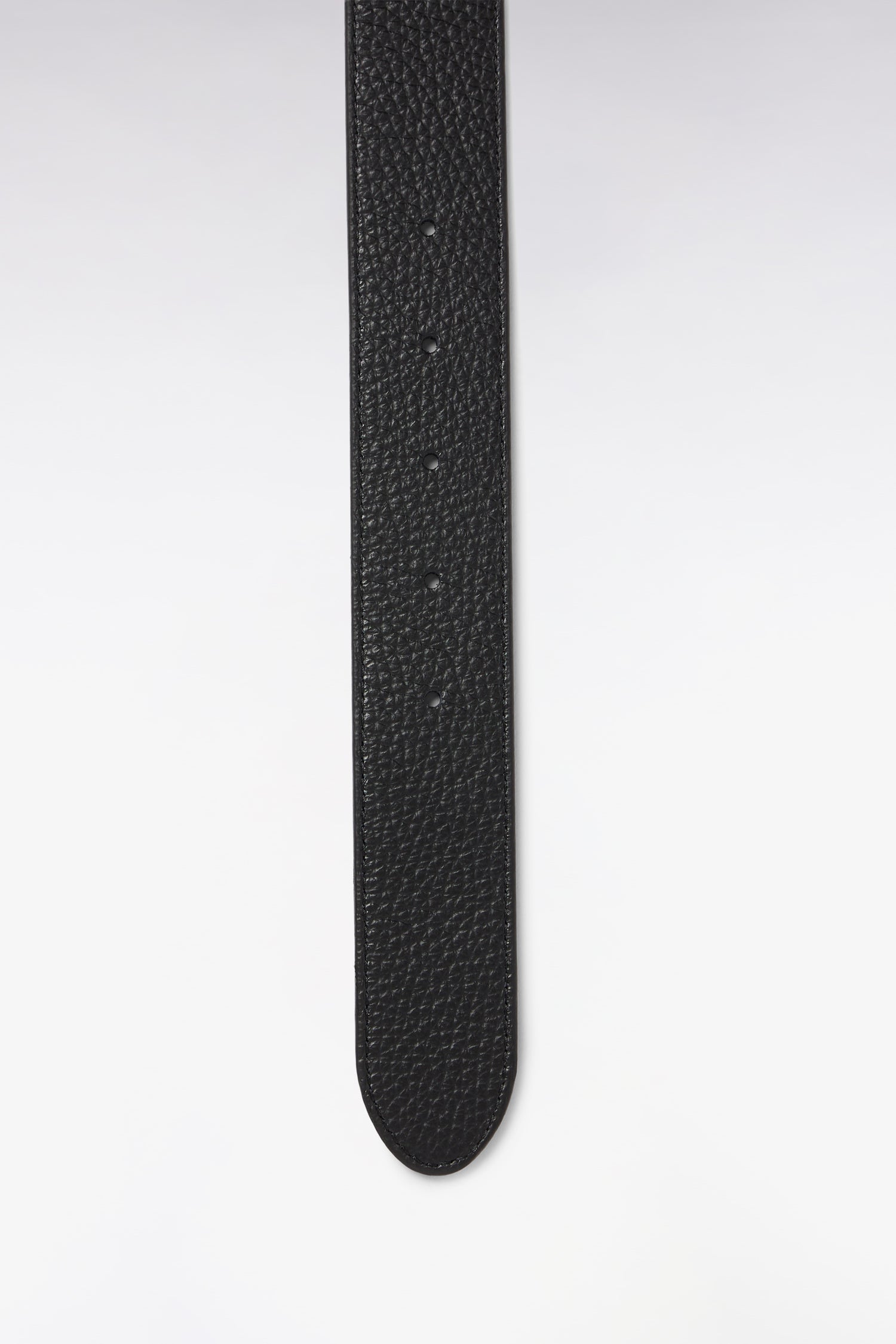 Black pebbled leather belt with visible edge stitching and multiple adjustment holes, ending in a rounded tip.
