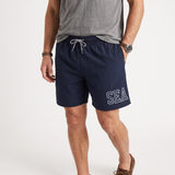 Navy blue relaxed-fit boxer beachwear shorts with an elasticated waistband, white and navy drawstring, and "SEA" graphic on t