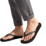 Black Emporio Armani men's beachwear slippers with a flat sole and a white logo on the thong strap.